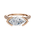 The 18K Rose Gold Bezel Half Bezel East/West Classic Dome 3-Row-Pave 2.0mm Engagement Ring features a unique east/west setting with sparkling pave diamonds along the band for timeless elegance.