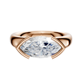 A 14K rose gold engagement ring featuring a classic dome design with a 4.0mm half bezel east/west setting.