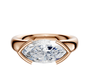 A 14K rose gold engagement ring featuring a classic dome design with a 4.0mm half bezel east/west setting.