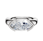 A 18K white gold bezel half bezel east/west classic dome 4.0mm engagement ring, featuring a large marquise-cut clear gemstone in a four-prong setting, displayed against a plain white background.