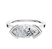 A 14K white gold cathedral engagement ring with a flat 1.5mm band, featuring a marquise-cut diamond in an east/west half bezel setting, displayed on a plain white background.
