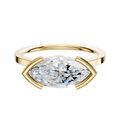 An 18K yellow gold Bezel Half Bezel East/West Cathedral Flat 1.5mm engagement ring with a marquise-cut diamond, shown on a plain white background.