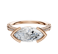 A 14K rose gold engagement ring with a flat cathedral design, featuring an east/west bezel-set center stone and a 3-row pave band adorned with small round diamonds.
