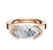 The 14K Rose Gold Bezel Half Bezel East/West Cathedral Flat 3.0mm Engagement Ring features a marquise-cut diamond set horizontally in a modern bezel setting, displayed against a plain white background.