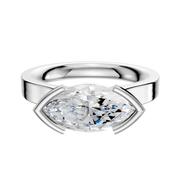 An 18K white gold half bezel east/west cathedral flat 3.0mm engagement ring, featuring a modern design with the diamond set horizontally, displayed against a plain white background.
