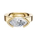 A 14K yellow gold engagement ring with a wide band and a flat, 4.0mm east/west cathedral setting in a modern half bezel style.