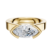 An 18K yellow gold engagement ring with a flat 4.0mm cathedral band in a half bezel east/west setting, shown against a plain white background.