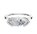 A 14K white gold engagement ring with a classic flat 1.5mm band features an east/west set gemstone in a half bezel setting, shown on a white background.
