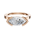 The 14K Rose Gold Bezel Half Bezel East/West Classic Flat 2.0mm Engagement Ring features a large marquise-cut diamond set horizontally, shown against a plain white background.