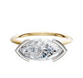 An 18K two-tone bezel half bezel east/west cathedral knife edge 1.5mm engagement ring displayed against a plain white background.
