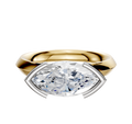 A 14K two-tone engagement ring with a 3.0mm knife-edge band, featuring an east/west cathedral setting in a half bezel style.