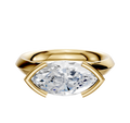An 18K yellow gold Cathedral knife edge engagement ring with a 3.0mm marquise-cut diamond in an east/west half bezel setting, accented by four gold prongs, shown on a plain white background.