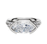 A 14K two-tone bezel half bezel East/West classic knife edge engagement ring with a 2.5mm band and a single row of pavé diamonds, set against a plain white background.