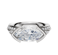 An 18K white gold half bezel east/west classic knife edge engagement ring with a 2.5mm marquise-cut center stone and a single row of pave diamonds along the band, displayed on a plain white background.