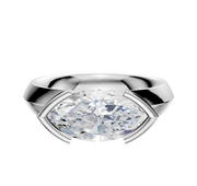 The 18K White Gold Bezel Half Bezel East/West Classic Knife Edge 4.0mm Engagement Ring showcases a horizontally set marquise diamond on a thick band, displayed against a plain white background.