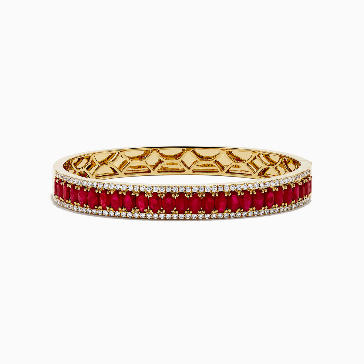 The 18K Yellow Gold Ruby and Diamond Bangle features a honeycomb-patterned interior, with a row of rubies bordered by two rows of sparkling diamonds on the outside.