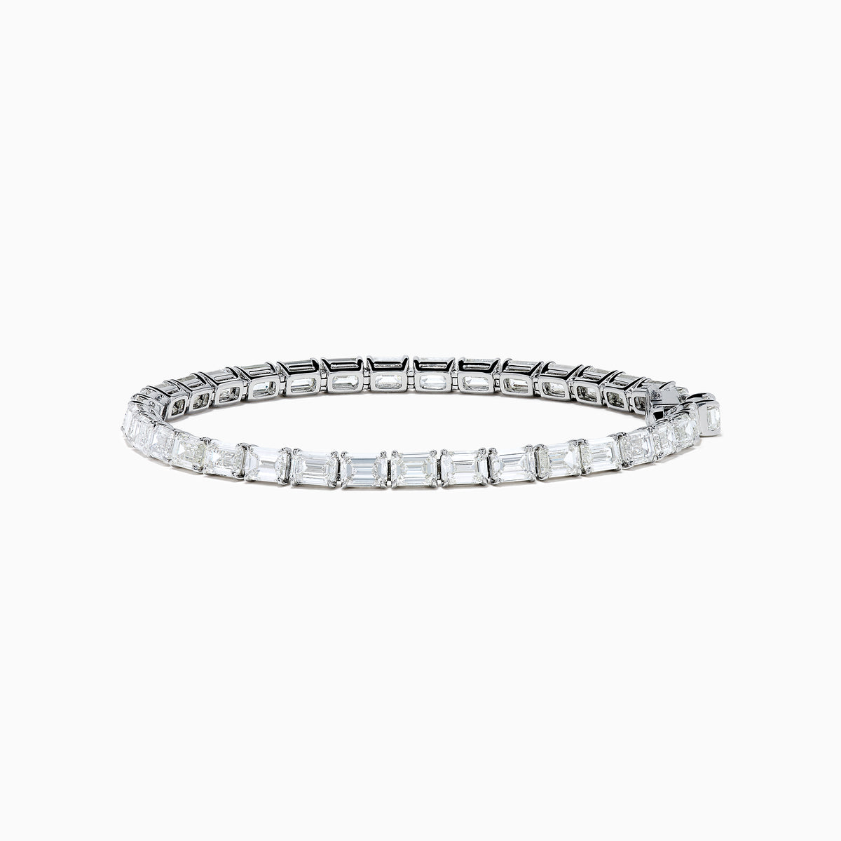 The Platinum Emerald Cut 14.47 Ct. Diamond Tennis Bracelet features a continuous row of prong-set, emerald cut diamonds displayed on a plain white background.