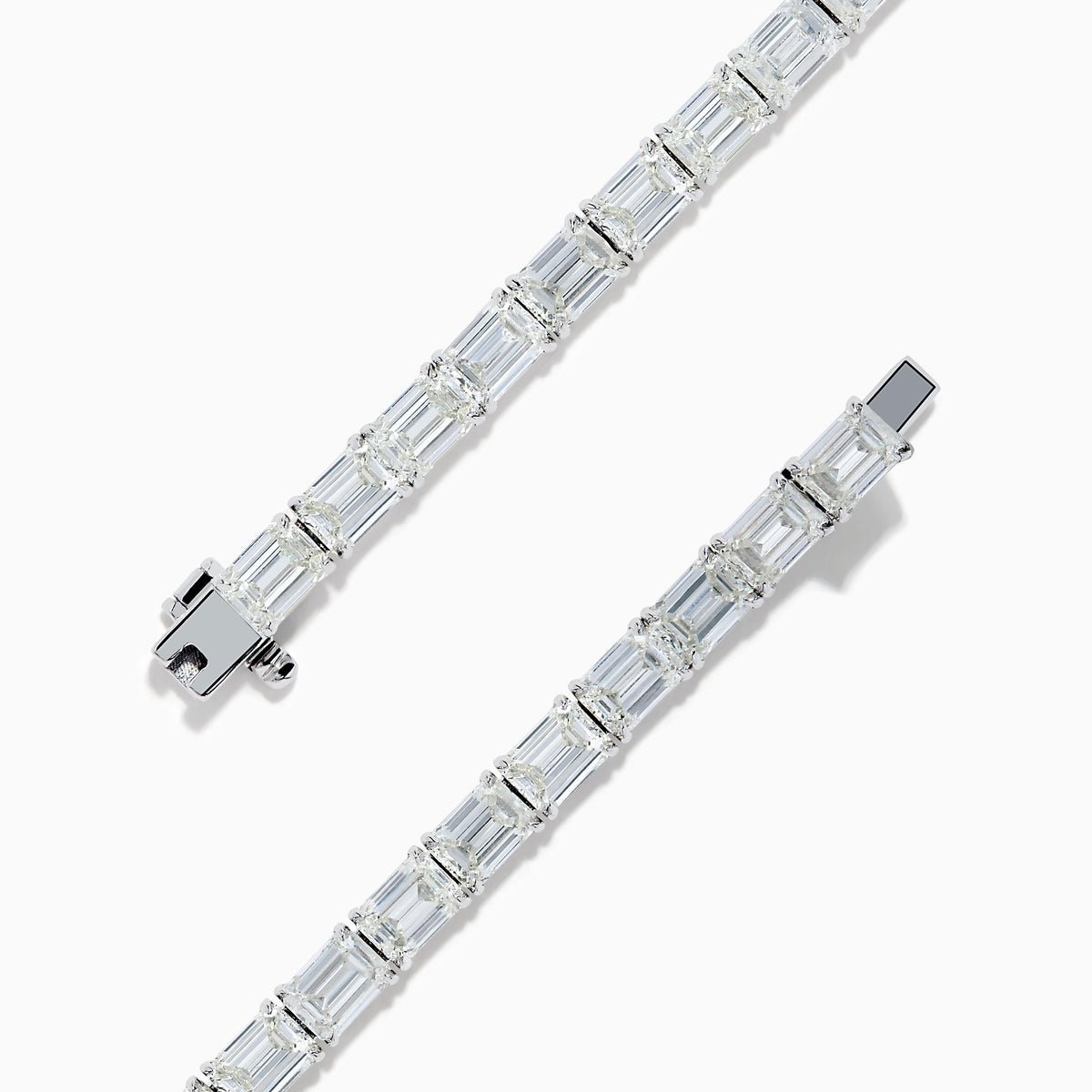The Platinum Emerald Cut 14.47 Ct. Diamond Tennis Bracelet features a continuous row of prong-set, emerald cut diamonds displayed on a plain white background.