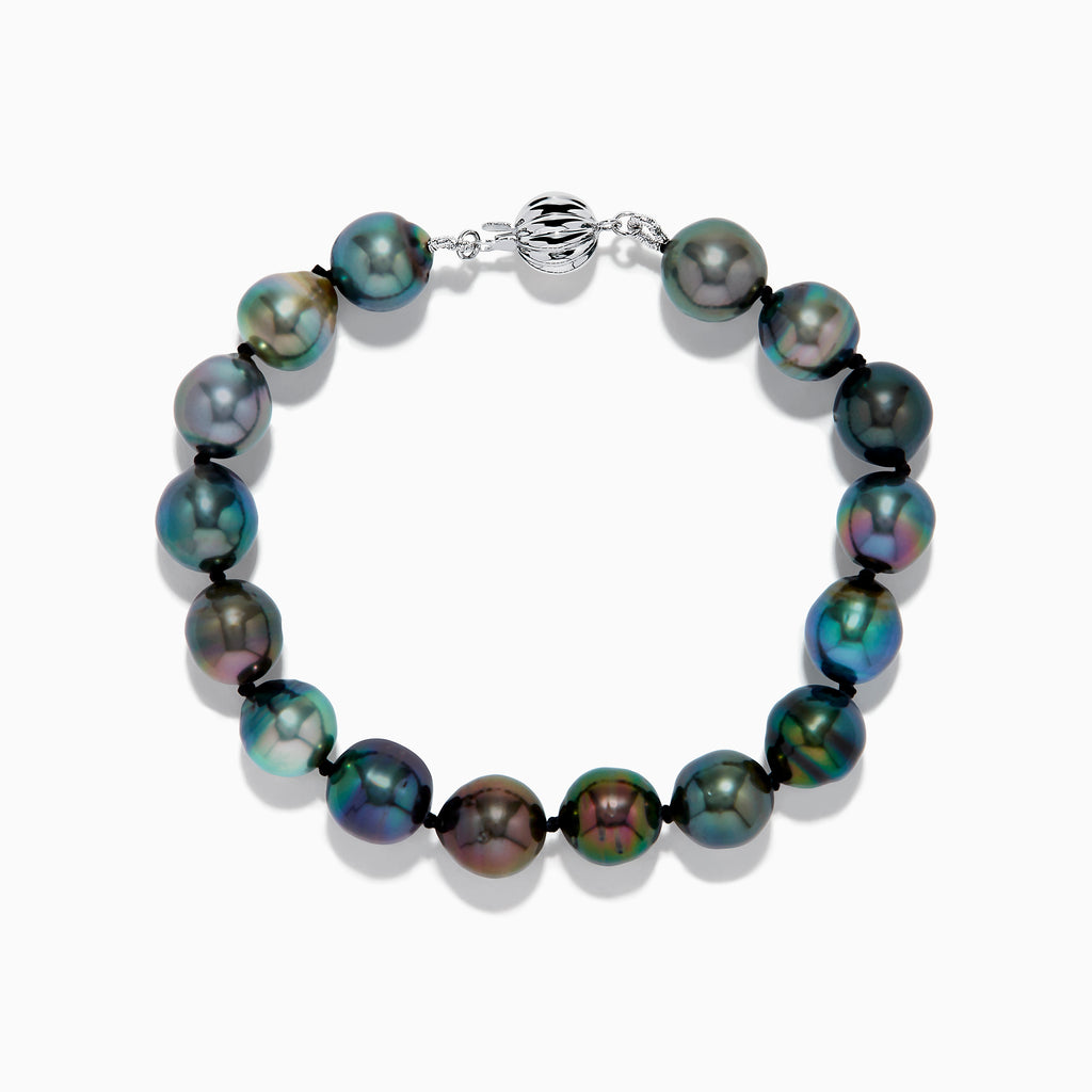 The 14K White Gold Tahitian Pearl Bracelet features round, iridescent Tahitian pearls and a 14K white gold clasp, shown arranged in a circle on a white background.