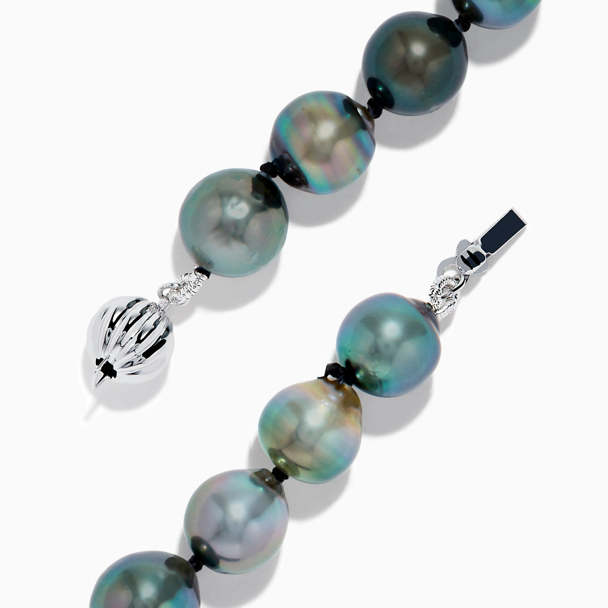 The 14K White Gold Tahitian Pearl Bracelet features round, iridescent Tahitian pearls and a 14K white gold clasp, shown arranged in a circle on a white background.