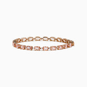 The Blush 14K Rose Gold Morganite and Diamond Tennis Bracelet showcases a single row of square-cut light pink morganite gemstones and sparkling diamonds set closely around the rose gold band.