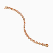 The Blush 14K Rose Gold Morganite and Diamond Tennis Bracelet showcases a single row of square-cut light pink morganite gemstones and sparkling diamonds set closely around the rose gold band.
