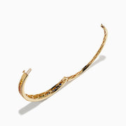 The Watercolors 14K Gold Multi Sapphire and Diamond Bangle dazzles with two diamond rows framing a central rainbow of blue, green, yellow, orange, pink, and red sapphires in a stunning gradient pattern.