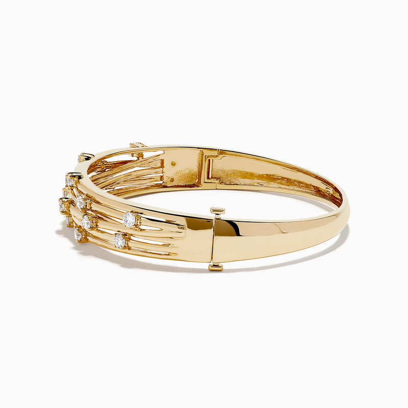 The D'oro 14K Yellow Gold Interwoven Crossover Bangle features multiple slim, interlaced bands adorned with evenly spaced round white gemstones, set in yellow gold for a radiant look.