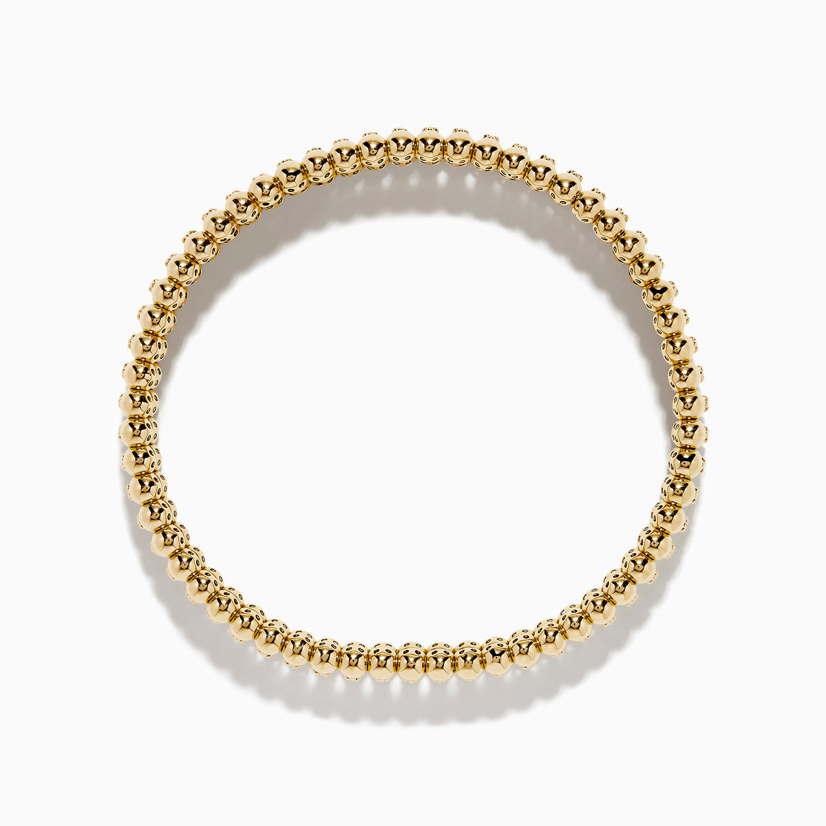 The D'Oro 14K Yellow Gold Diamond Stretch Bracelet features rounded beads and a central row of sparkling diamonds in a symmetrical, elegant design.