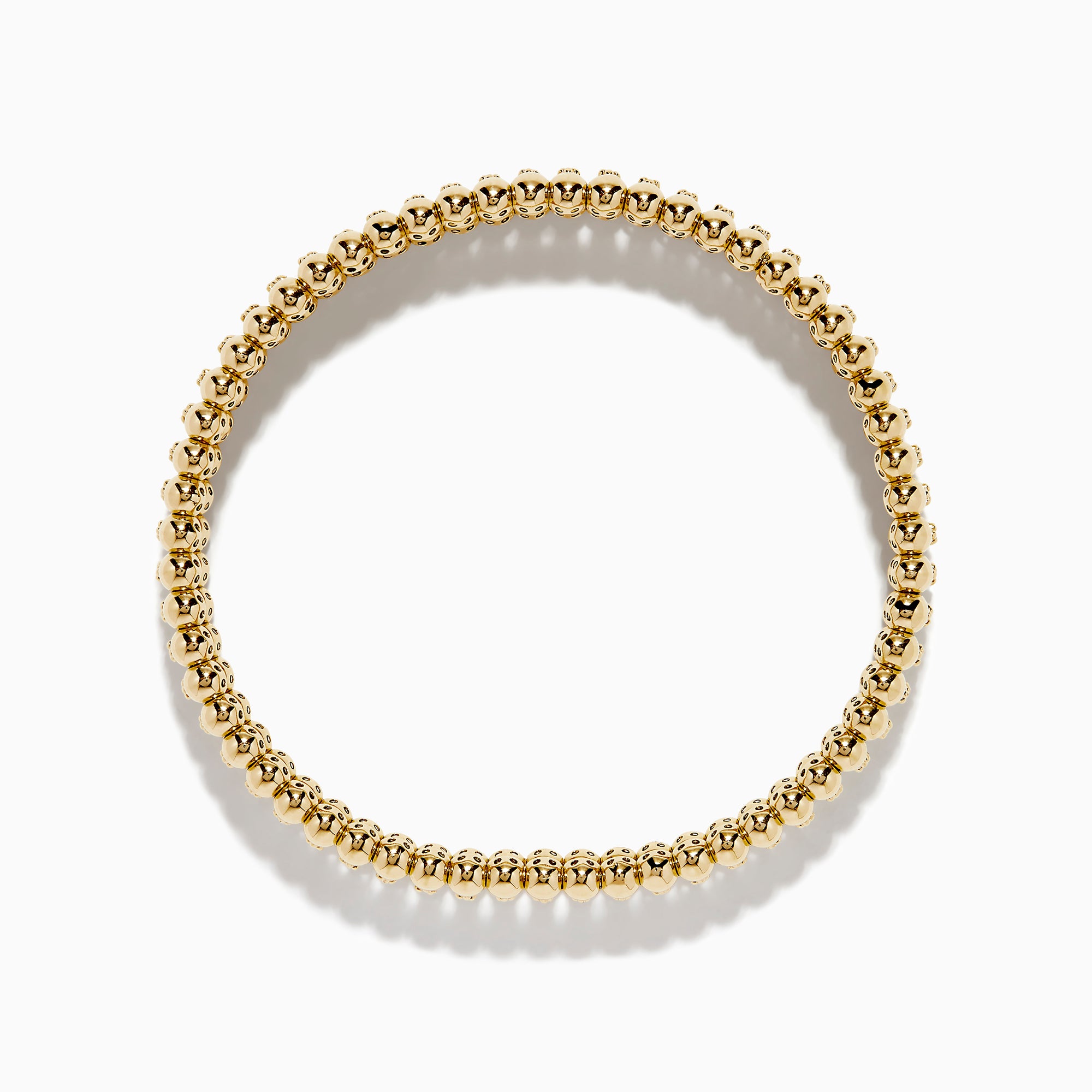 The D'Oro 14K Yellow Gold Diamond Stretch Bracelet features rounded beads and a central row of sparkling diamonds in a symmetrical, elegant design.