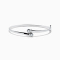 The Pave Classica 14K White Gold Two-of-Us Diamond Bangle features two round bezel-set diamonds at the open ends, showcased on a plain white background.