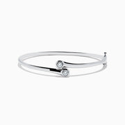 The Pave Classica 14K White Gold Two-of-Us Diamond Bangle features two round bezel-set diamonds at the open ends, showcased on a plain white background.