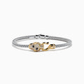 The Signature 14K Two Tone Gold Diamond and Emerald Panther Bangle features a silver mesh bracelet and a panther-shaped clasp with diamond accents and emerald eyes, shown on a white background.