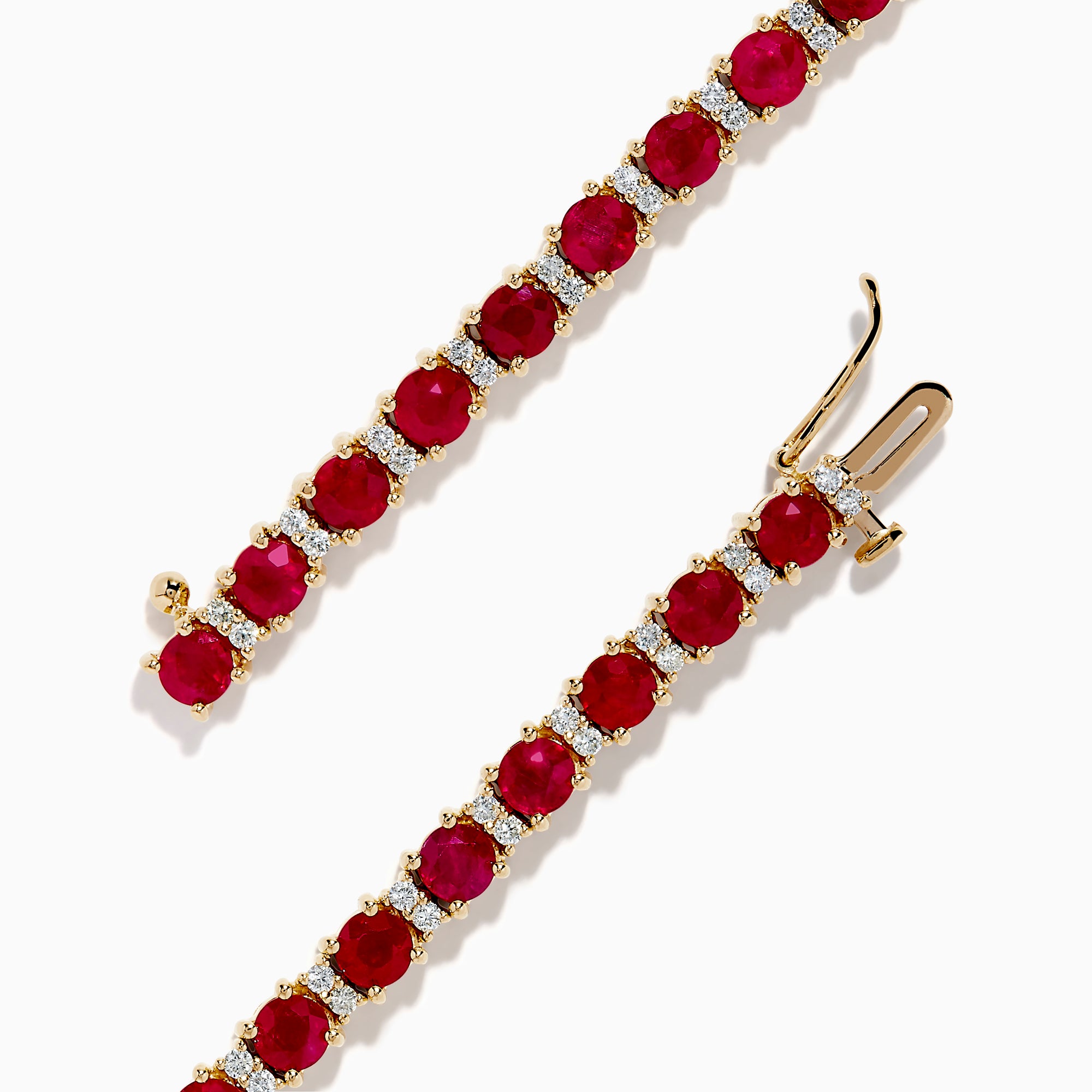 The Ruby Royale 14K Yellow Gold Ruby and Diamond Tennis Bracelet features a single row of round rubies and diamonds in prong settings, elegantly displayed against a white background.