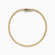 The 14K Yellow Gold 1.0 Ct. Diamond Tennis Bracelet showcases a single row of round white diamonds in individual settings, presented on a plain white background.