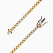 The 14K Yellow Gold 1.0 Ct. Diamond Tennis Bracelet showcases a single row of round white diamonds in individual settings, presented on a plain white background.