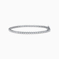 The 14K White Gold 1.0 Ct. Diamond Tennis Bracelet showcases a single row of round sparkling diamonds set in a lustrous white gold band, displayed against a plain white background.