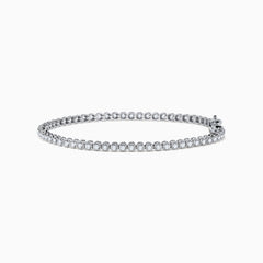 The 14K White Gold 1.0 Ct. Diamond Tennis Bracelet showcases a single row of round sparkling diamonds set in a lustrous white gold band, displayed against a plain white background.
