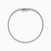 The 14K White Gold 1.0 Ct. Diamond Tennis Bracelet showcases a single row of round sparkling diamonds set in a lustrous white gold band, displayed against a plain white background.