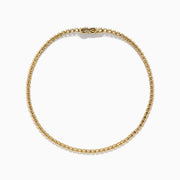 The 14K Yellow Gold 0.25 Ct. Diamond Tennis Bracelet features small, evenly spaced round diamonds and is displayed on a white background.