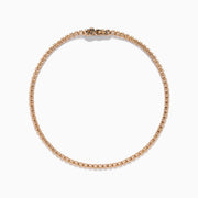 The 14K Rose Gold 0.25 Ct. Diamond Tennis Bracelet features a continuous row of sparkling round-cut diamonds, elegantly photographed on a white background.