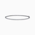 The 14K White Gold 0.25 Ct. Diamond Tennis Bracelet features a row of sparkling diamonds set in a slender band, shown against a white background.