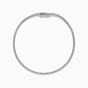 The 14K White Gold 0.25 Ct. Diamond Tennis Bracelet features a row of sparkling diamonds set in a slender band, shown against a white background.