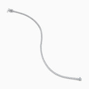 The 14K White Gold 0.25 Ct. Diamond Tennis Bracelet features a row of sparkling diamonds set in a slender band, shown against a white background.