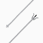 The 14K White Gold 0.25 Ct. Diamond Tennis Bracelet features a row of sparkling diamonds set in a slender band, shown against a white background.