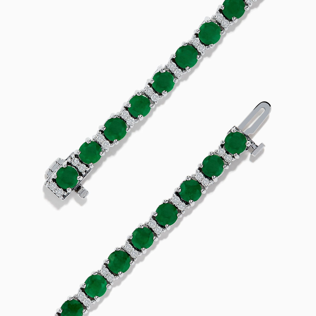 The Brasilica 14K White Gold Emerald Tennis Bracelet features a continuous row of round green gemstones in prong settings, showcased on a white background.