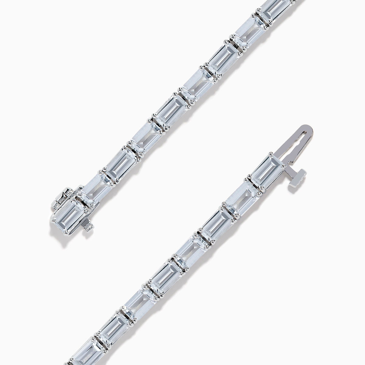 A 14K White Gold White Sapphire Tennis Bracelet with rectangular clear sapphires in individual links, shown on a plain white background.