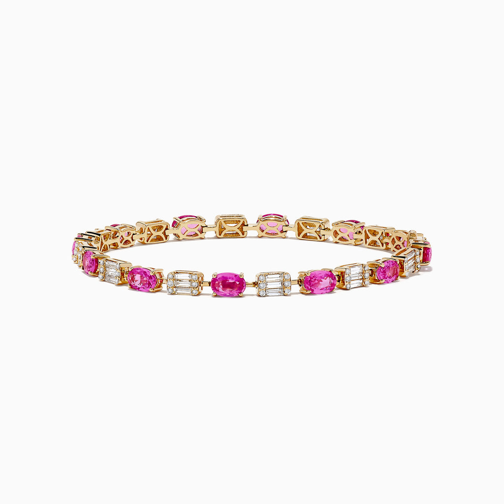 The 14K Yellow Gold Pink Sapphire and Diamond Tennis Bracelet features alternating oval pink sapphires and rectangular white diamonds set in an intricate yellow gold band.