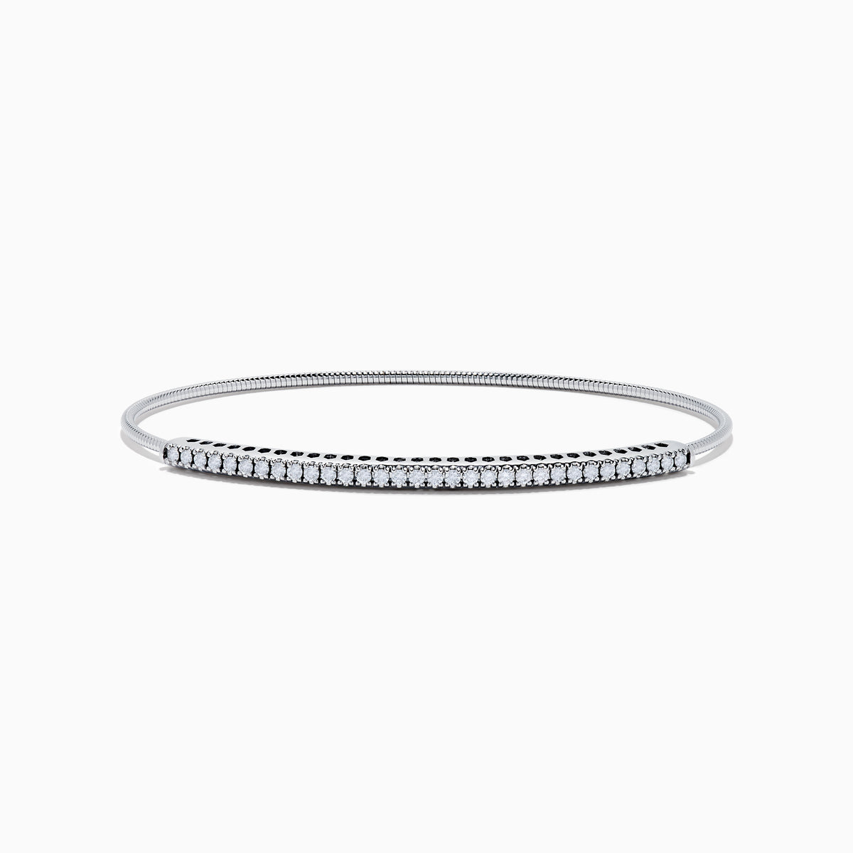 The 14K White Gold Flexible Diamond Bangle features a row of sparkling diamonds set along the top in a minimalist, elegant design, displayed on a plain white background.