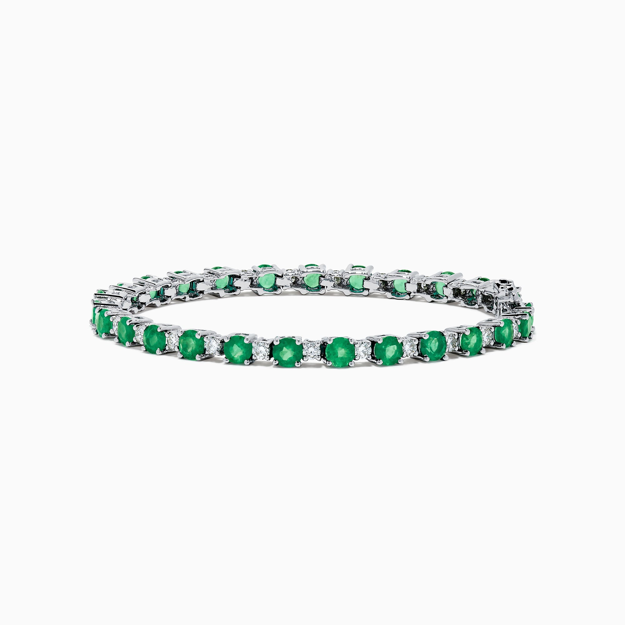 The Brasilica 14K White Gold Emerald and Diamond Tennis Bracelet features alternating round green emeralds and clear diamonds, beautifully displayed on a white background.